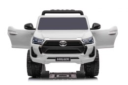 Toyota Hilux na akumulator dla dzieci Biały Pickup + Napęd 4x4 + Pilot + 2 bagażniki
